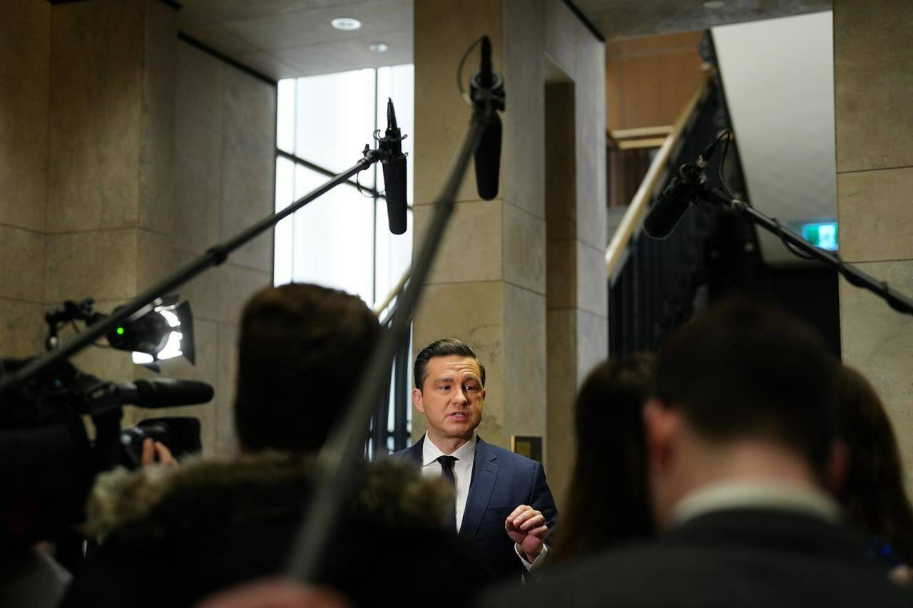 Conservative Leader Pierre Poilievre talks to media at a party caucus meeting on Parliament Hill in Ottawa on Wednesday, Feb.7, 2024. THE CANADIAN PRESS/Sean Kilpatrick