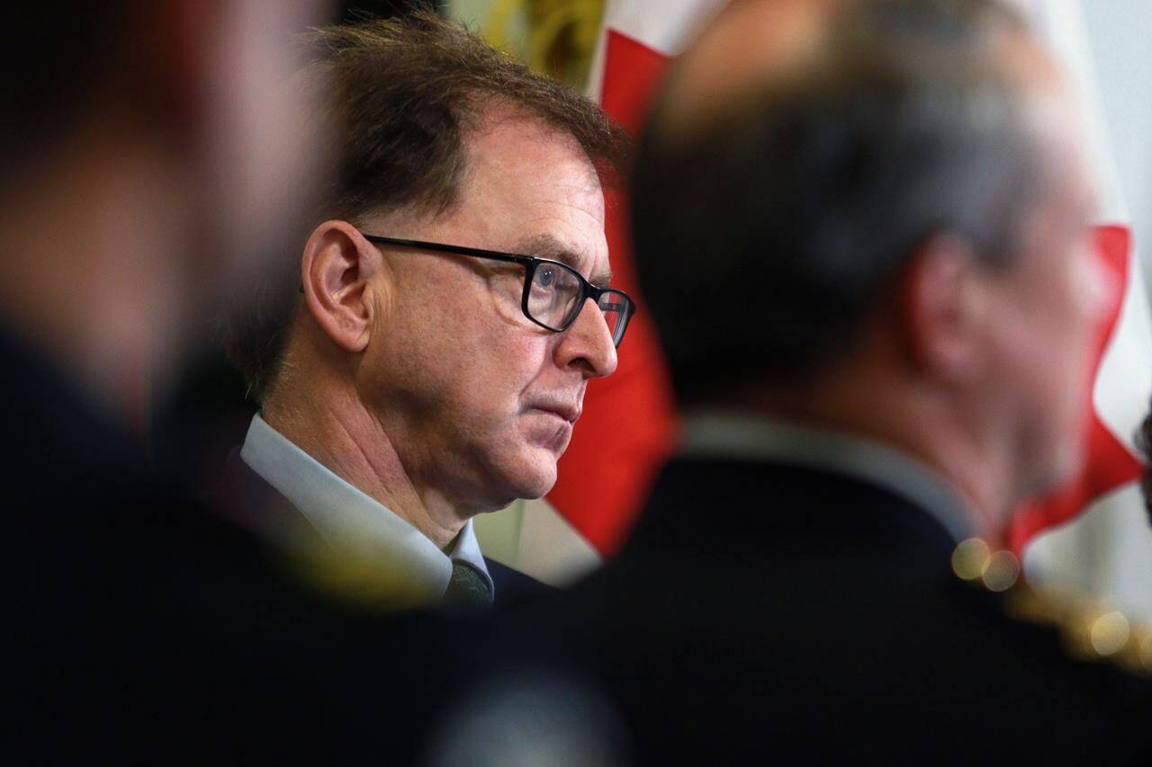 Health Minister Adrian Dix looks on during a press conference in Victoria, on Nov. 9, 2023. Dix was in Vancouver of Feb. 9, 2023 to provide an update on B.C. primary health-care system one year after changing the payment model for family physicians. THE CANADIAN PRESS/Chad Hipolito