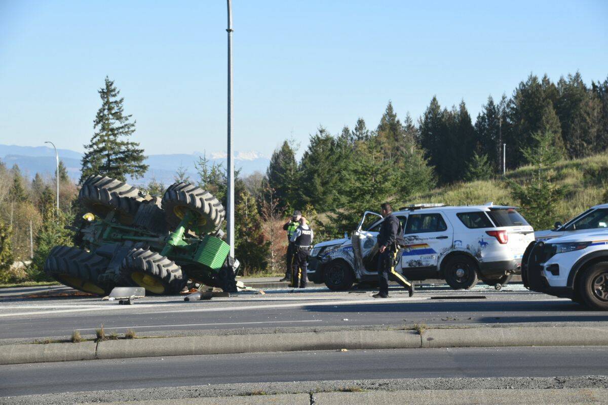 Police chased the tractor along Highway 1 until the 176th Street offramp, where it collided with a BC Highway Patrol vehicle on Nov. 25, 2023. (Photo: Curtis Kreklau/ South Fraser News Services)