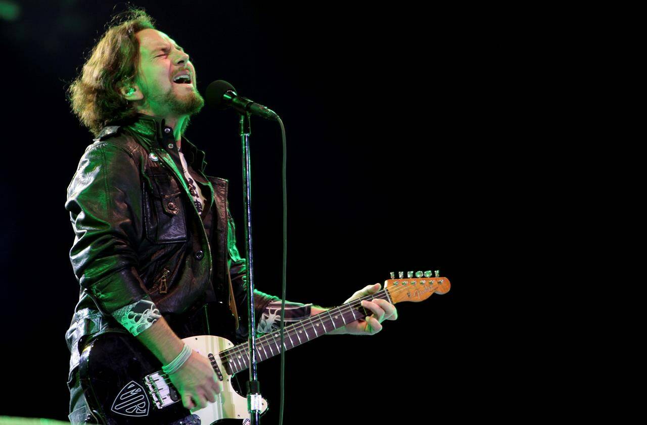 FILE - Pearl Jam’s lead vocalist Eddie Vedder performs in concert in Sao Paulo, Brazil on Nov. 3, 2011. Pearl Jam’s forthcoming album shows the rockers are not mellowing with age. Vedder and other members of the band that began in Seattle in the early 1990s gave an advance listen of their 12th studio album to a select group of family, friends and industry insiders on Wednesday, Jan. 31, 2024, at the Troubadour club in the Los Angeles area. Vedder told the crowd the album is “our best work.” (AP Photo/Andre Penner, File)