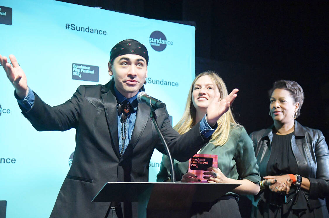 Julian Brave NoiseCat, left, and Emily Kassie accept the jury prize for directing Sugarcane, a film about the St. Joseph’s Mission Residential School near Williams Lake. The film premiered at the Sundance Film Festival in January 2024. (Monica Lamb-Yorski photo - Williams Lake Tribune)