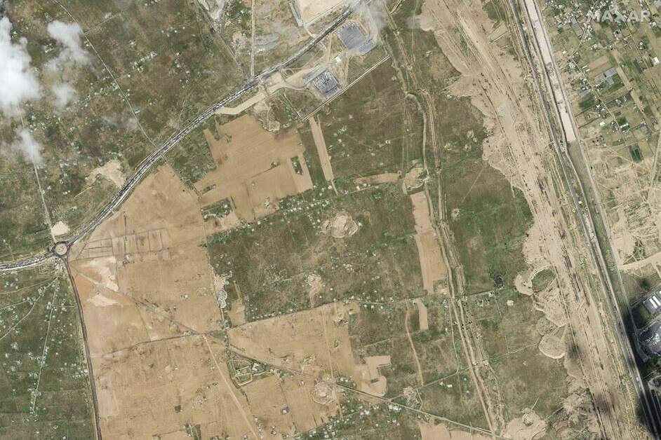 This satellite image provided by Maxar Technologies shows wall construction in Rafah, Egypt, Thursday, Feb. 15, 2024. (Maxar Technologies via AP)