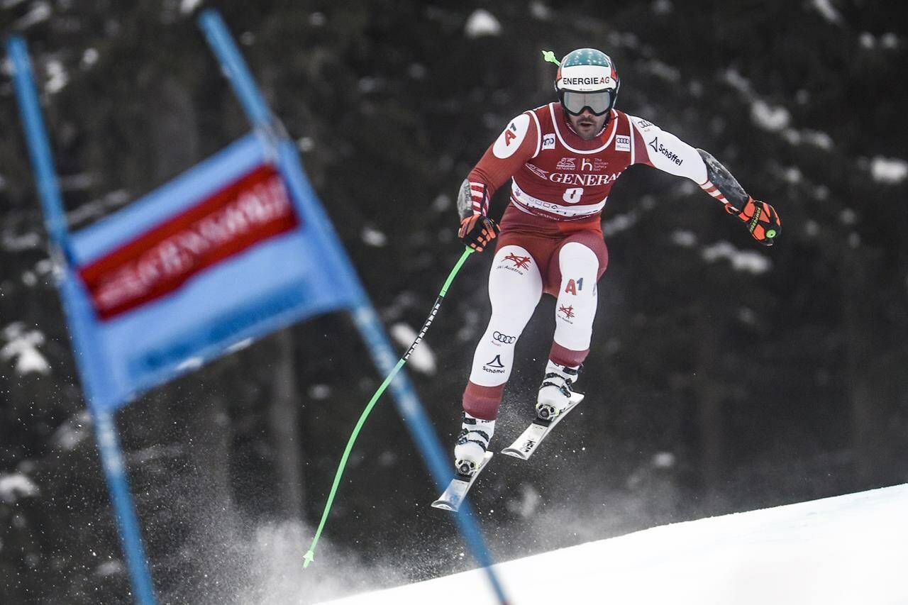 Austria’s Vincent Kriechmayr speeds down the course during an alpine ski, men’s World Cup super-G, in Kvitfjell, Norway, Sunday, Feb. 18, 2024. (AP Photo/Gabriele Facciotti)