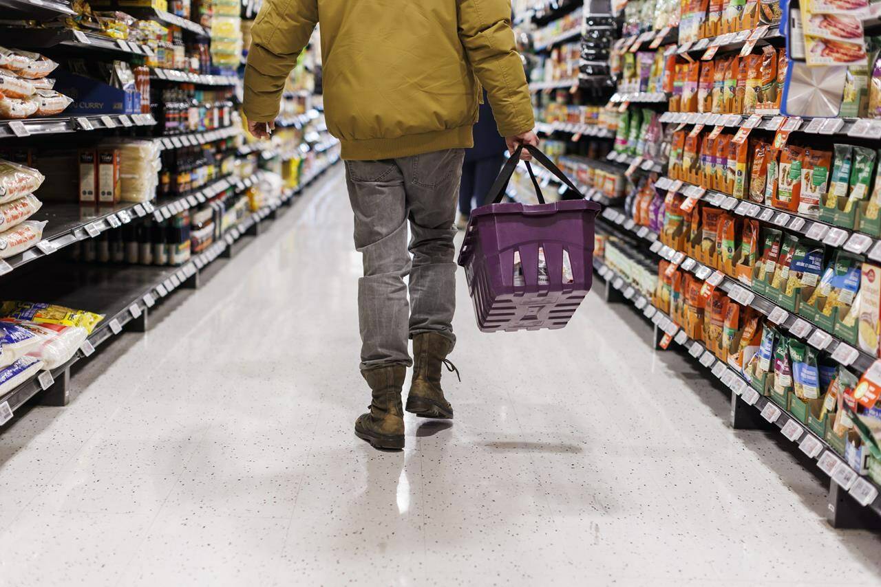 Statistics Canada is set to release its January consumer price index report on Tuesday and forecasters expect Canada’s inflation rate fell. A customer browses an aisle at a Metro grocery store In Toronto on Friday, Feb. 2, 2024. THE CANADIAN PRESS/Cole Burston