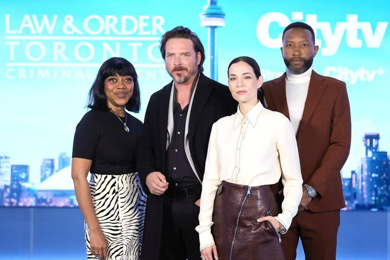 Cast members (left to right) Karen Robinson, Aden Young, Kathleen Munroe, and K.C. Collins pose for a photo at a press junket as they promote the television series “Law & Order Toronto: Criminal Intent” in Toronto on Tuesday, Feb. 20, 2024. THE CANADIAN PRESS/Chris Young
