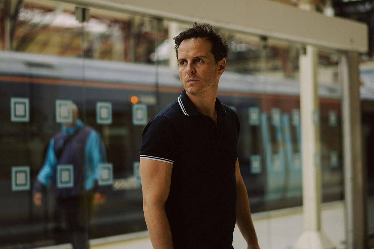 This image released by Searchlight Pictures shows Andrew Scott in a scene from “All of Us Strangers.” (Searchlight Pictures via AP)