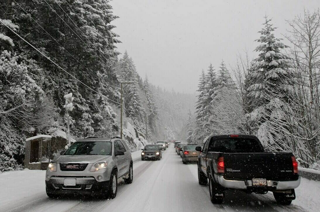 Traffic slows to a crawl during heavy snow on the Sea to Sky Highway 25 kilometres north of Vancouver, B.C., on Wednesday, Dec. 17, 2008. A special weather statement for a wintry mix of rain and snow has prompted an advisory for drivers in parts of British Columbia’s South Coast to prepare for poor road conditions. THE CANADIAN PRESS/Darryl Dyck