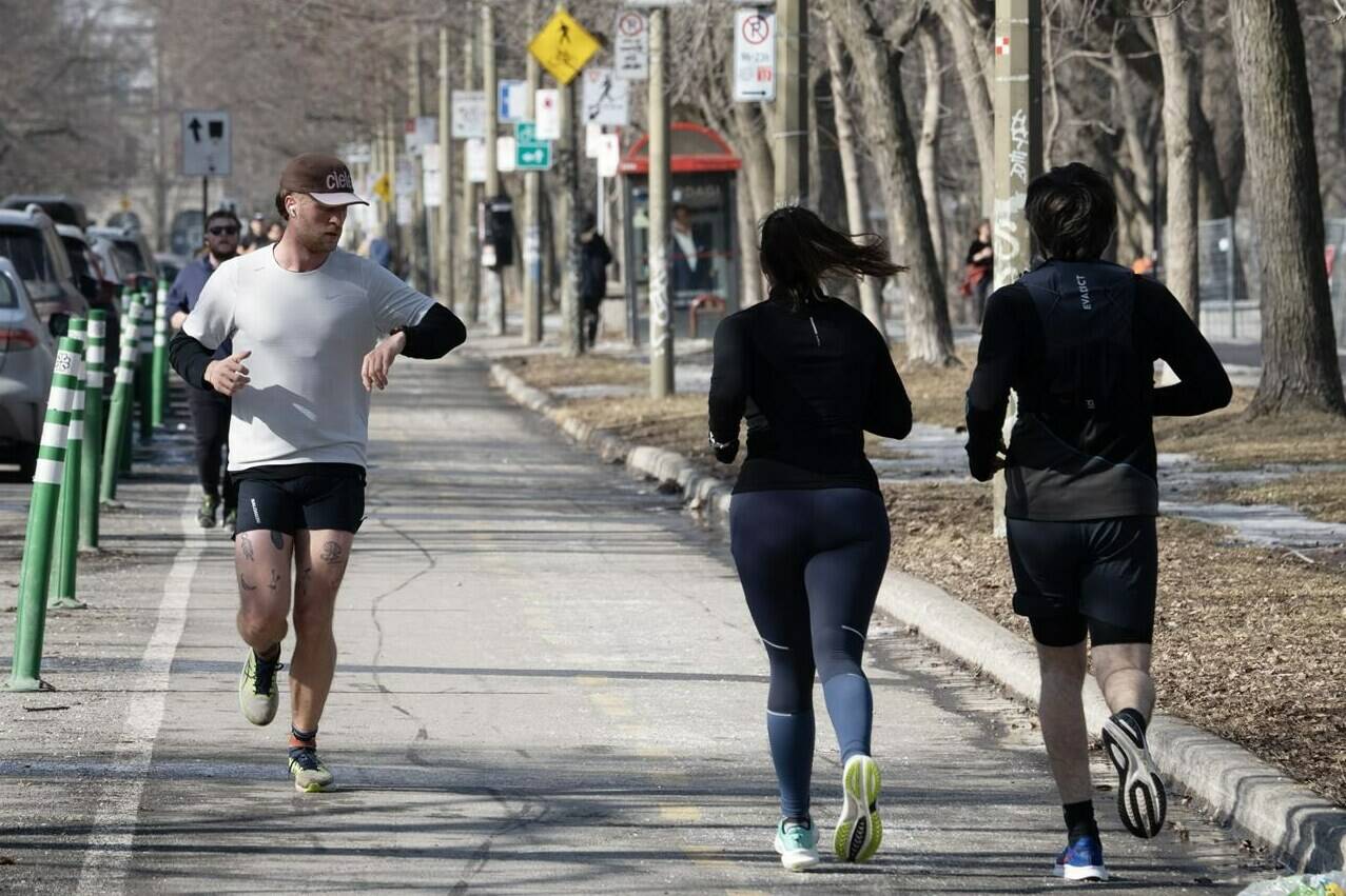 Most Canadians can look forward to a warmer-than-normal spring, but they should also brace for the season’s “profound mood swings,” according to The Weather Network’s latest outlook. Runners enjoy the mild temperatures in Montreal on Tuesday, February 27, 2024.THE CANADIAN PRESS/Ryan Remiorz