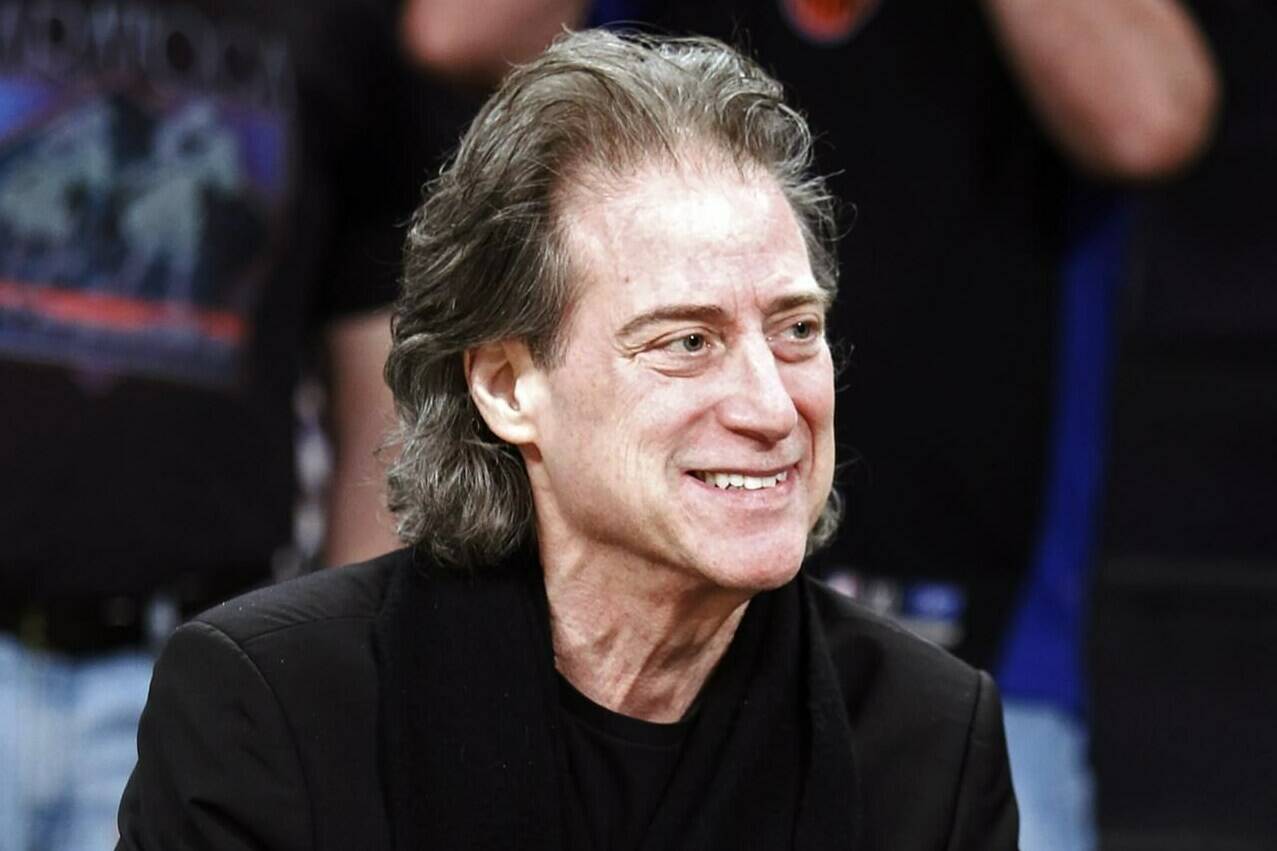 FILE - Comedian Richard Lewis attends an NBA basketball game in Los Angeles on Dec. 25, 2012. (AP Photo/Alex Gallardo, File)