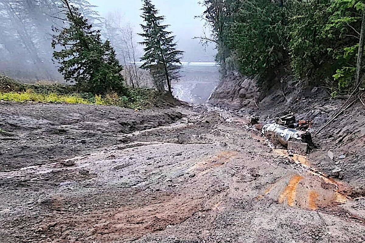 The oil tank owned by Key-West Asphalt after it slid down a slope in Herrling Channel on the Fraser River near Hope. (Ram Environmental)