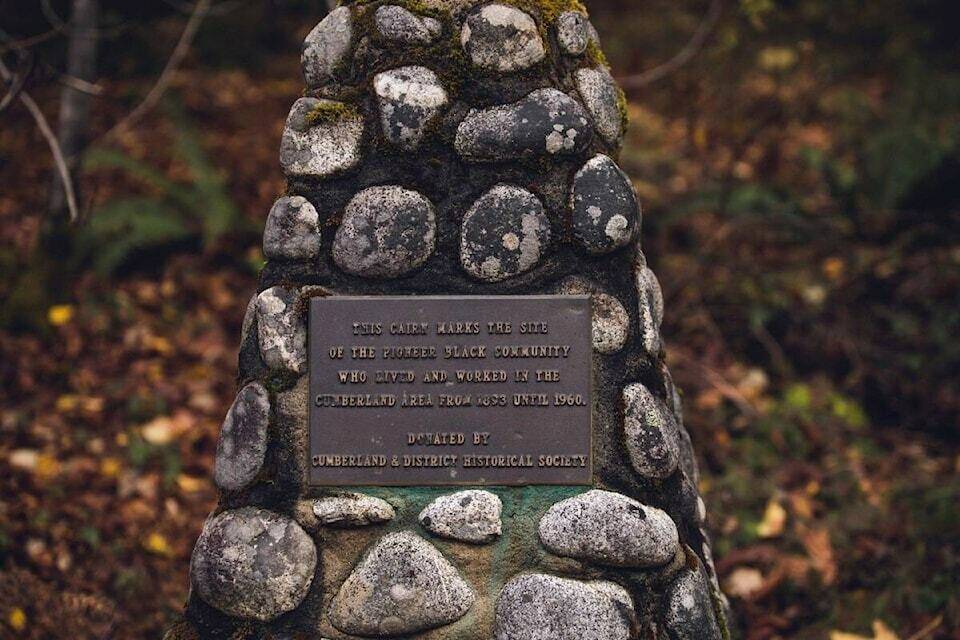 This cairn on the way to Comox Lake from Cumberland marks where the village’s Black community once stood. Photo by Ali Roddam