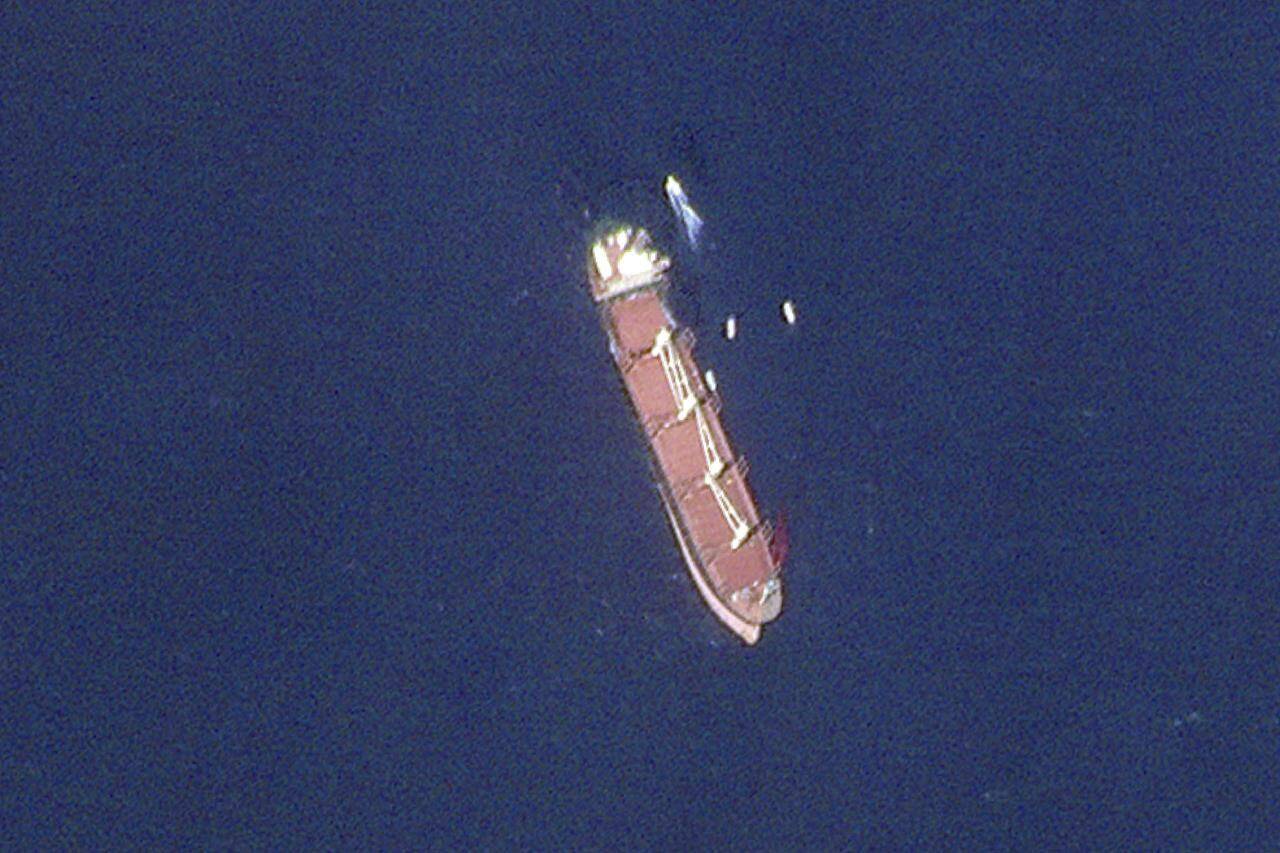 This satellite image taken by Planet Labs PBC shows the Belize-flagged ship Rubymar in the Red Sea on Wednesday, Feb. 28, 2024. The Rubymar, earlier attacked by Yemen’s Houthi rebels, has sunk in the Red Sea after days of taking on water, officials said Saturday, March 2, 2024, the first vessel to be fully destroyed as part of their campaign over Israel’s war against Hamas in the Gaza Strip. (Planet Labs PBC via AP)