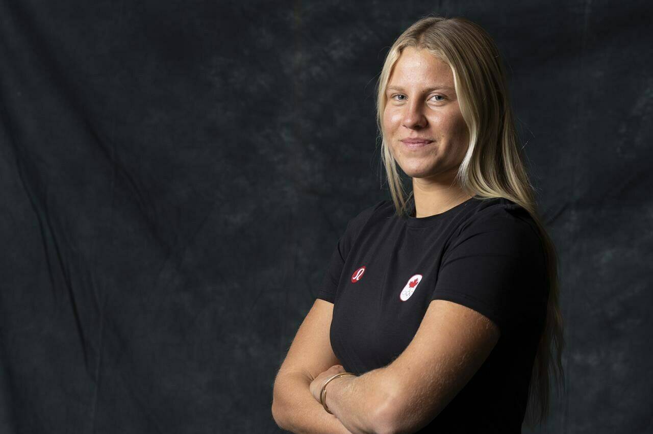 Canadian athlete and surfer Sanoa Olin, poses during media day organized by the Canadian Olympic Committee in Montreal on Thursday, Dec.,14, 2023. THE CANADIAN PRESS/Christinne Muschi