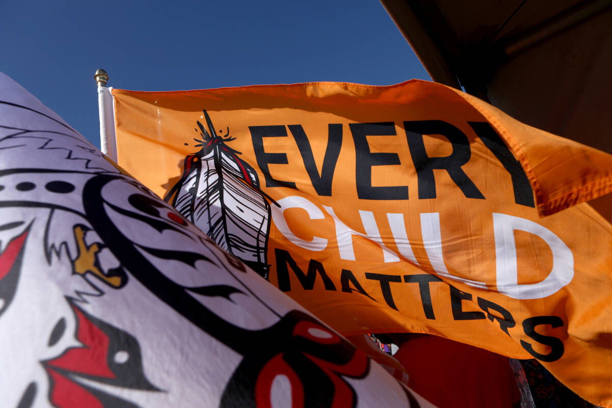 An ‘Every Child Matters’ flag seen during the second annual South Island Powwow at Royal Athletic Park in Victoria, Saturday, Sept. 30, 2023. THE CANADIAN PRESS/Chad Hipolito