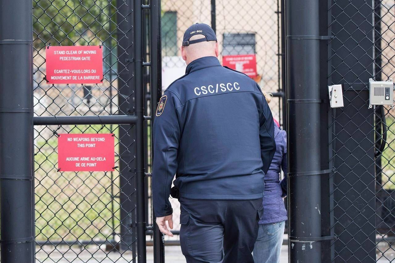 A convicted murderer who overpowered a guard while on a day outing in Alberta and took hostages during a nine-day crime spree more than a decade ago has been denied parole. A correctional officer enters the gate at Millhaven Institution in Bath, Ont., Wednesday, Oct. 17, 2018. THE CANADIAN PRESS/Lars Hagberg