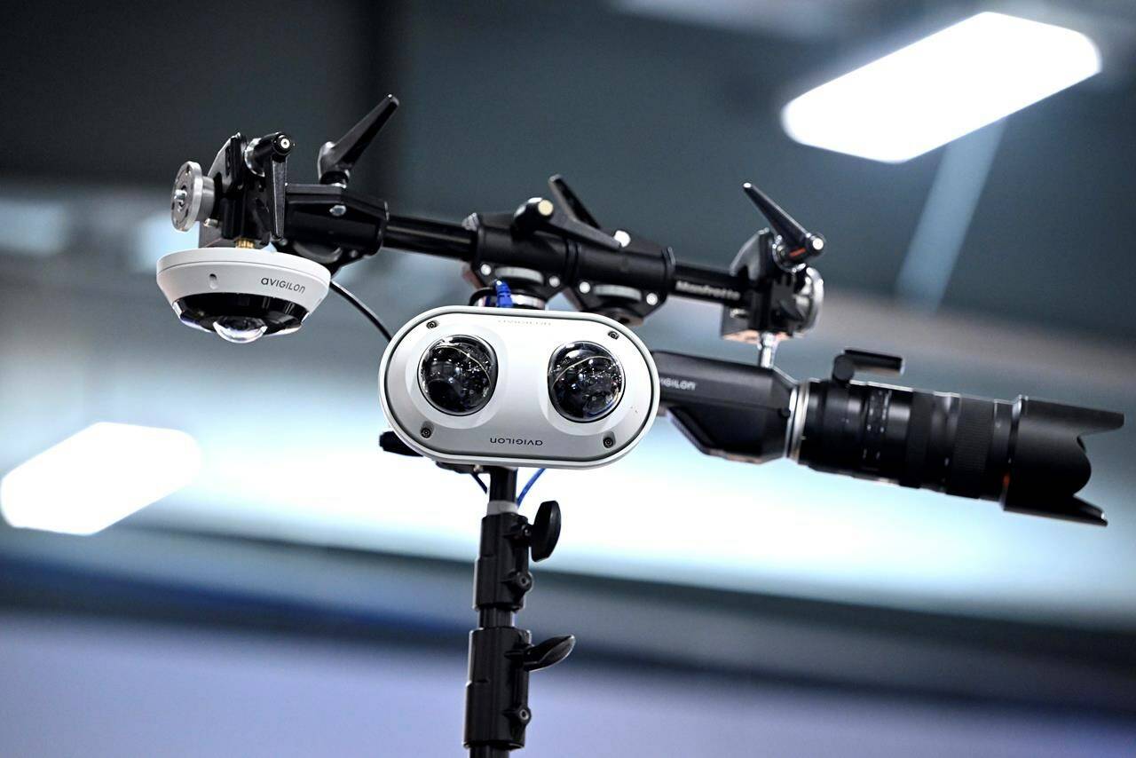 Employee surveillance technology, now turbocharged thanks to artificial intelligence, is being deployed—leaving Canadian laws to play catch up. Remote controlled cameras mounted on a pole are shown at the CANSEC trade show, in Ottawa, on Wednesday, May 31, 2023. THE CANADIAN PRESS/Justin Tang