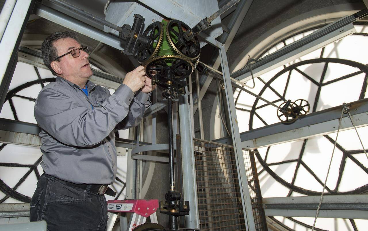 The seasonal tradition of “springing forward” meant most people in Canada moved their clocks an hour forward, switching to daylight time. John Scott of Scotiabell prepares the tower clock for daylight saving time change at Fire Station No. 315 in Toronto on Saturday, March 9, 2019. THE CANADIAN PRESS/Frank Gunn