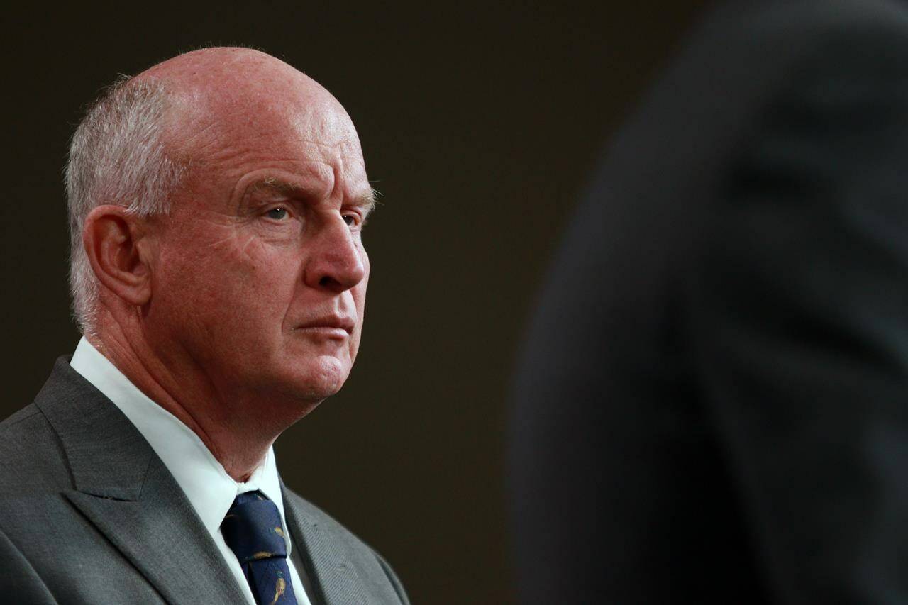 Minister of Public Safety and Solicitor General Mike Farnworth looks on during a press conference in the press theatre at legislature in Victoria, B.C., on Thursday, October 5, 2023. British Columbia’s solicitor general says there’s no evidence of widespread diversion of safe-supply opioids, after a recent drug seizure was cited by Alberta Premier Danielle Smith and Opposition Leader Pierre Poilievre to criticize the provincial program. THE CANADIAN PRESS/Chad Hipolito