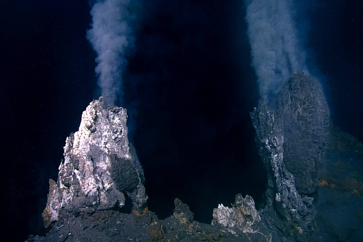 A remote operated vehicle captured shimmering water and black smoking chimneys the hydrothermal vents at Explorer ridge off the west coast of Vancouver Island during the 2023 Northeast Pacific Deep Sea Expedition. (Courtesy of the Northeast Pacific Deep Sea Expedition)