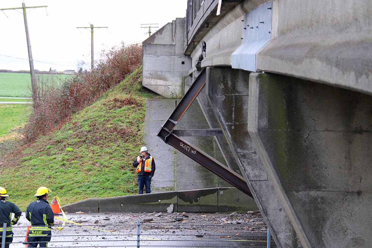 Emergency crews on scene in Delta after a truck hit the 112 Street overpass on Highway 99 on Dec. 29, 2023. it was the company Chohan Freight Forwarders Ltd’s sixth infrasrtucture hit in two years.	(Shane MacKichan photo)