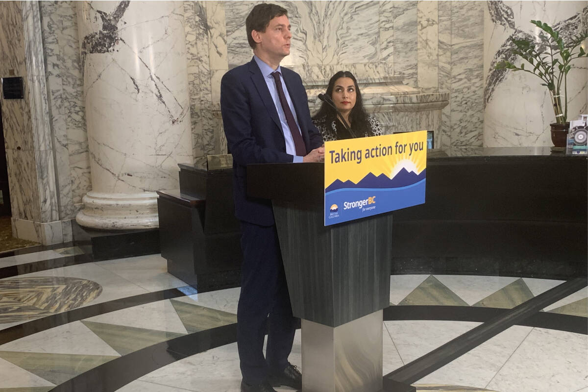 Premier David Eby and Attorney General Niki Sharma speak at the B.C. legislature on March 14, 2024, to discuss a new proposed law that would allow the province to take major companies to court if their actions harm British Columbians at a population level. (Wolf Depner/Black Press Media)
