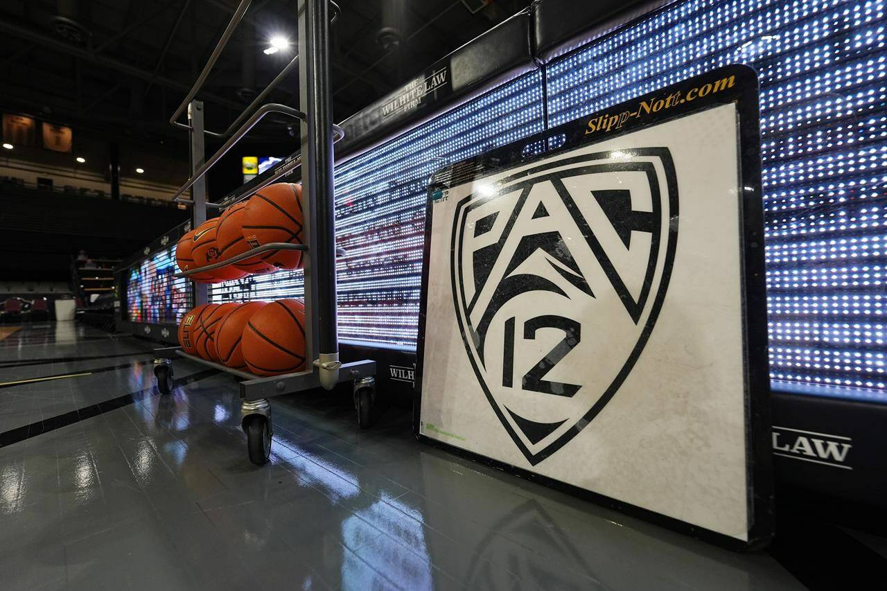 The PAC-12 logo is displayed on the traction mat used in front of the scorer’s table of the Events Center before the final conference regular-season NCAA college basketball game Sunday, March 3, 2024, in Boulder, Colo. (AP Photo/David Zalubowski)