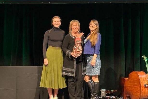 Ingrid Jarrett (centre), President & CEO of the B.C. Hotel Association has been named Business Woman of the Year by the Tourism Industry Association of BC. (TIABC) photo)