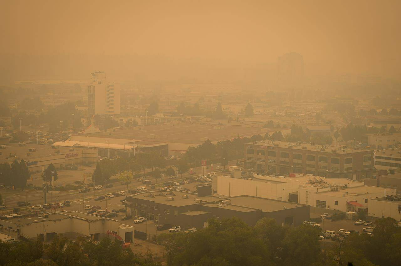 Smoke from wildfires fills the air in Kelowna, B.C., Saturday, Aug. 19, 2023. Canada’s air quality last year was worse than the United States for the first time since a firm started publishing its annual assessment in 2018. THE CANADIAN PRESS/Darryl Dyck