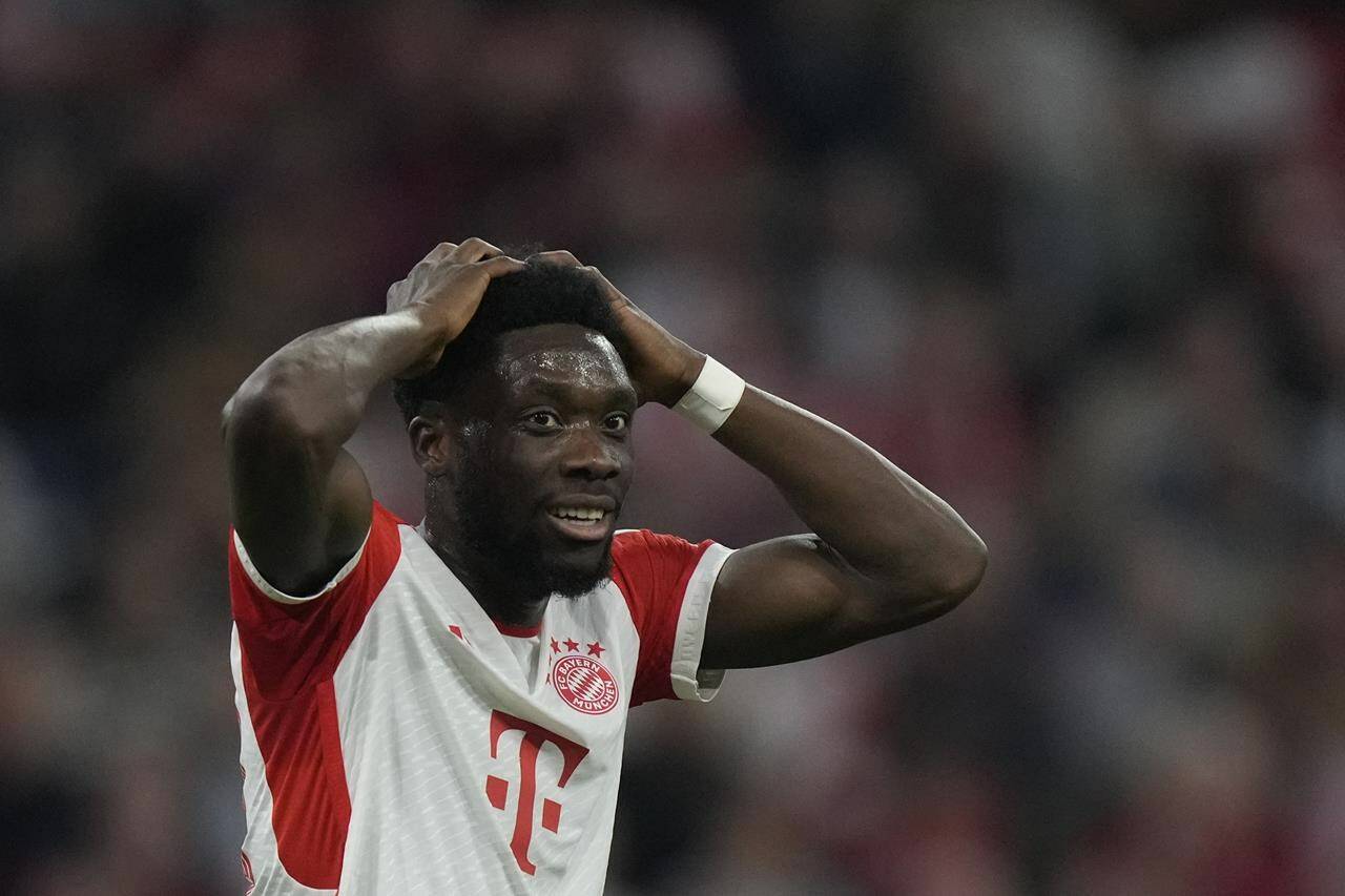 FILE -Bayern’s Alphonso Davies reacts during the German Bundesliga soccer match between FC Bayern Munich and SC Freiburg at the Allianz Arena stadium in Munich, Germany, Oct. 8, 2023. Bayern Munich sports director Max Eberl says the club has made its final offer to Canada left back Alphonso Davies to extend his contract amid reported interest from Real Madrid. Eberl tells the Sport Bild magazine, “I can say we made Alphonso a very concrete, appreciative offer. At some point in life you have to say yes or no.” (AP Photo/Matthias Schrader, File)