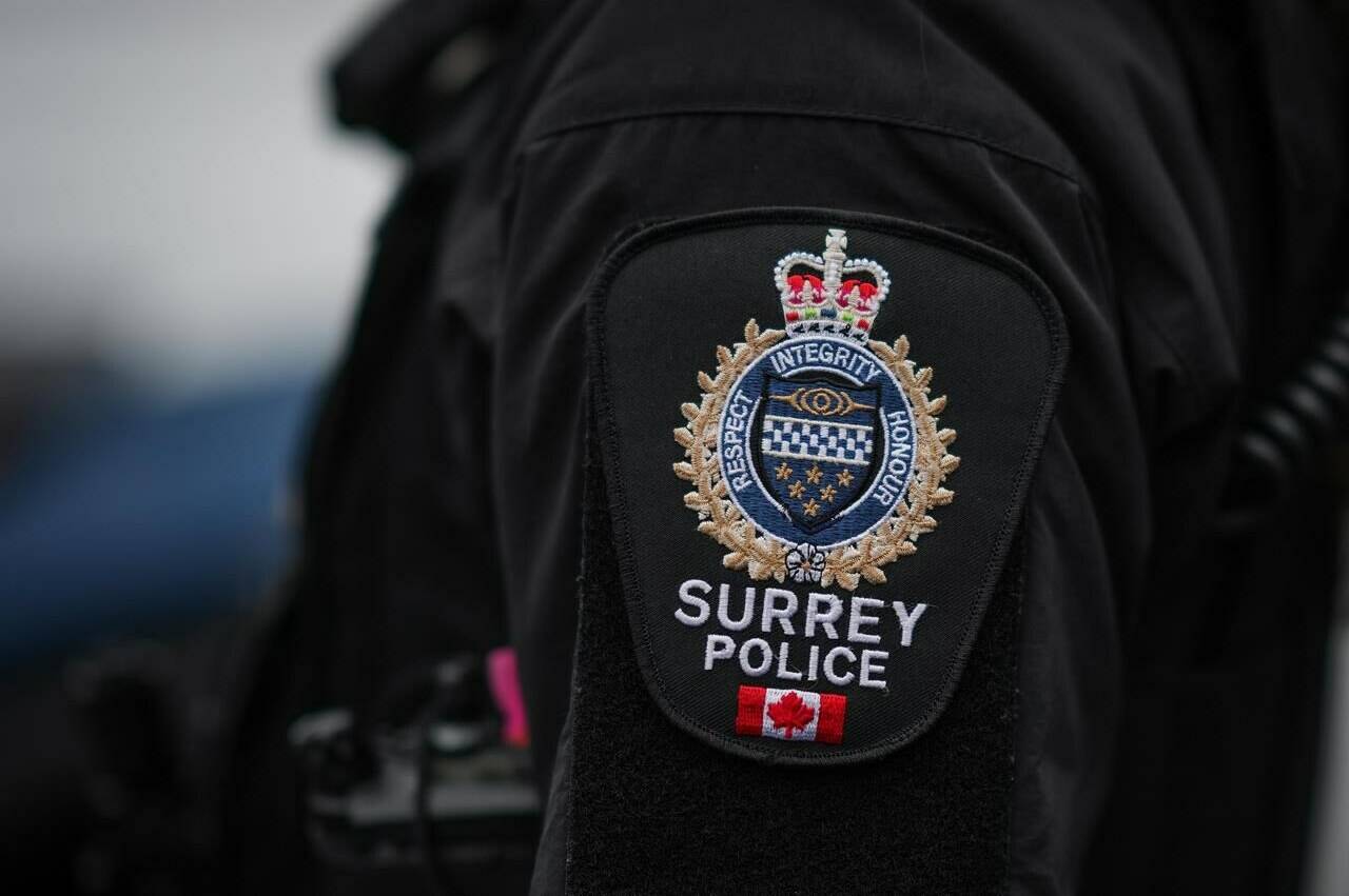 A Surrey police patch is shown in Surrey, B.C., on Saturday, April 22, 2023. The Victoria Police Board says a complaint by a former board member will be handled by investigators from Surrey and Delta. THE CANADIAN PRESS/Darryl Dyck