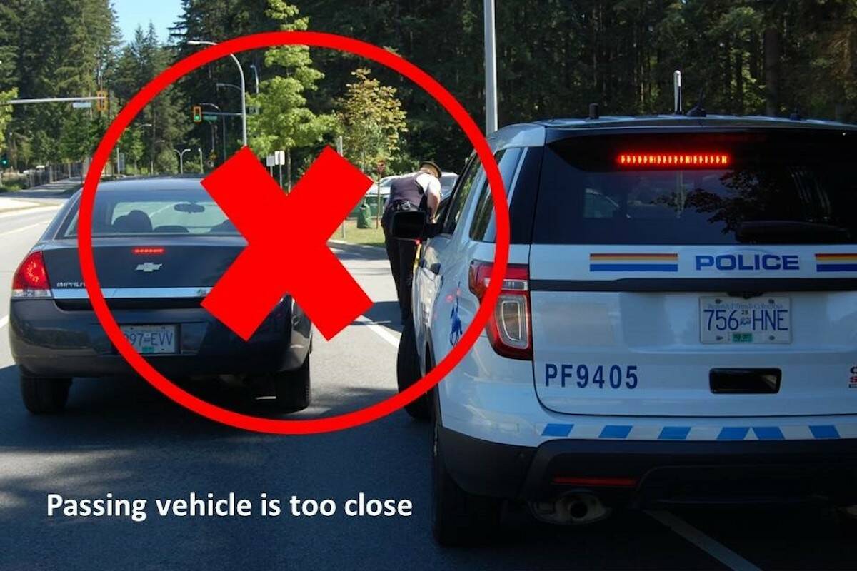 A vehicle passes by an RCMP officer too close during the 2024 Slow Down, Move Over campaign. (RCMP photo)