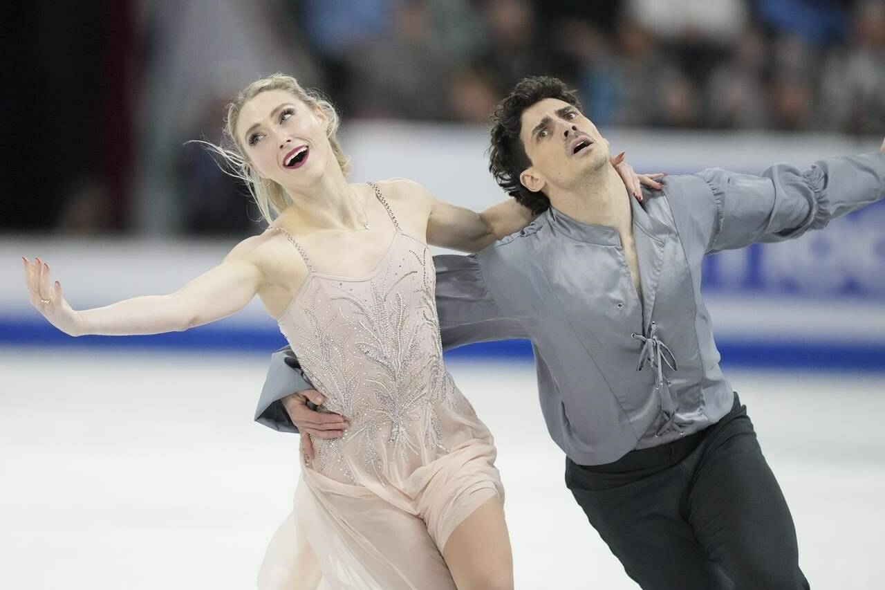 Piper Gilles and Paul Poirier of Canada perform their free dance in the ice dance competition at the 2024 ISU World Figure Skating Championships in Montreal, Saturday, March 23, 2024. THE CANADIAN PRESS/Christinne Muschi