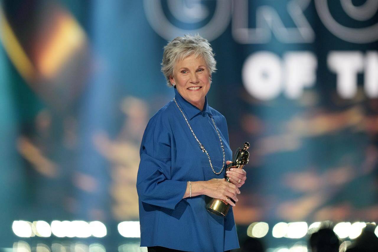 Anne Murray prepares to present the award for group of the year at the Juno awards, in Halifax, Sunday, March 24, 2024. THE CANADIAN PRESS/Darren Calabrese