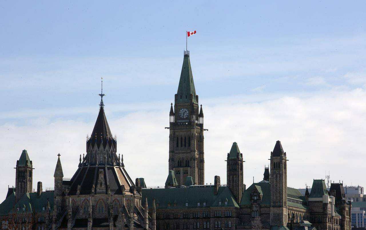 The Peace Tower on Parliament Hill is shown from Gatineau, Que., on Thursday, March 12, 2020. THE CANADIAN PRESS/Fred Chartrand