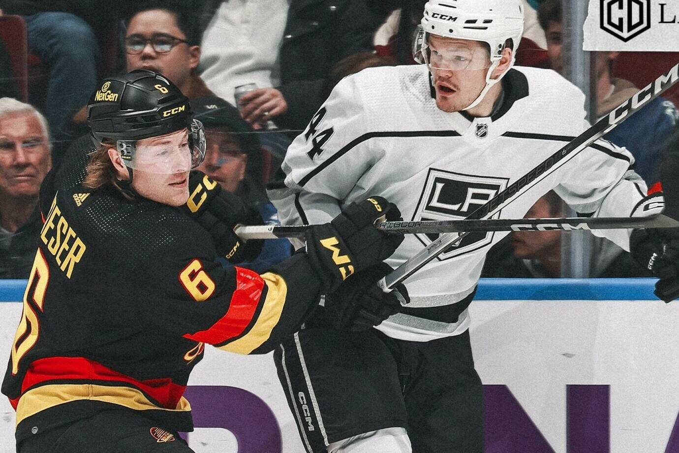 Vancouver’s Brock Boeser and Los Angeles’ Mikey Anderson battle for a puck in Monday night’s game at Rogers Arena. The Kings defeated the Canucks 3-2. Los Angeles Kings photo