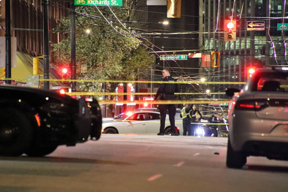 Vancouver police on scene of a shooting that injured one person in the downtown core Wednesday evening (April 3, 2024). (Shane MacKichan)