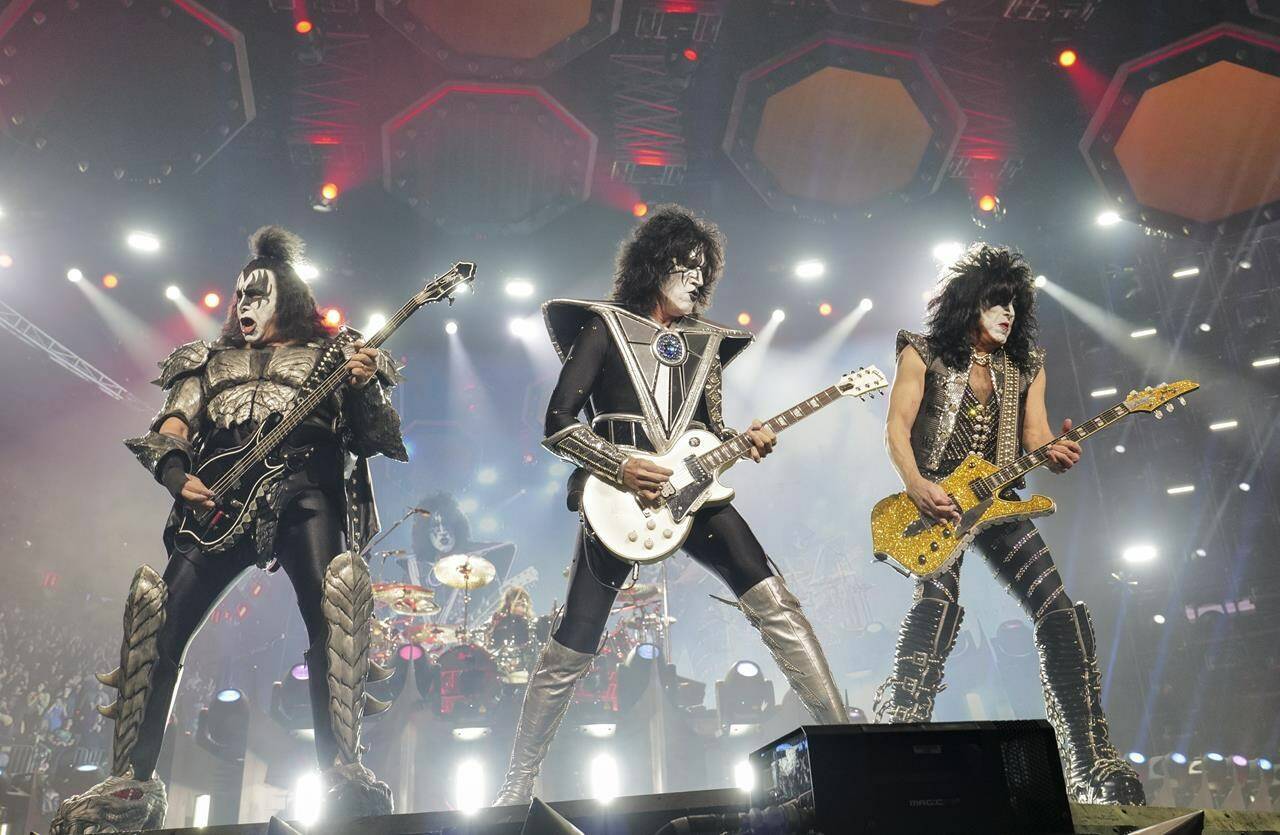 FILE - Gene Simmons, from left, Tommy Thayer, and Paul Stanley of KISS perform during the final night of the “Kiss Farewell Tour”at Madison Square Garden in New York on Dec. 2, 2023. (Photo by Evan Agostini/Invision/AP, File)