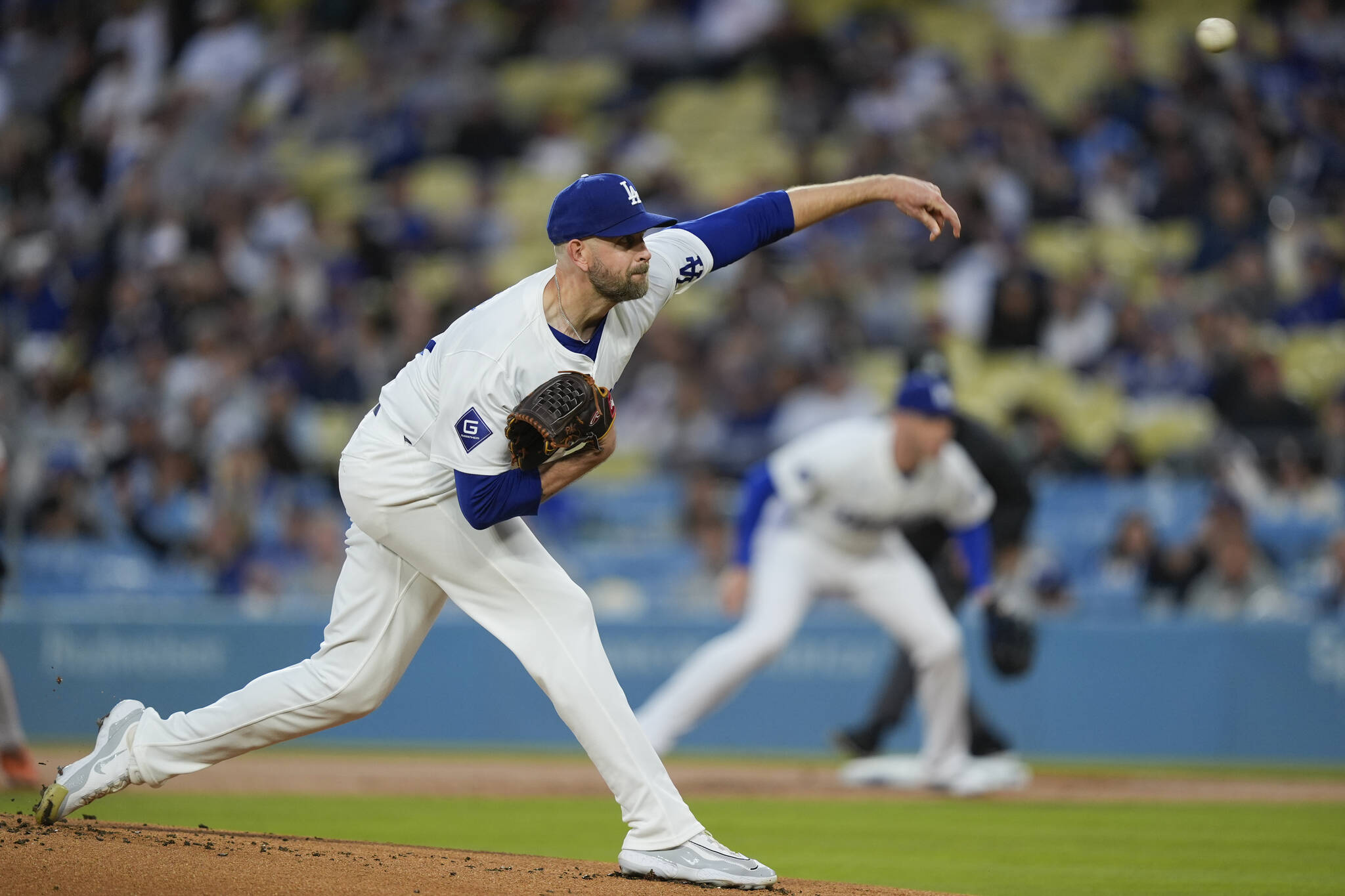 Los Angeles Dodgers starting pitcher James Paxton throws during the first inning of a baseball game against the San Francisco Giants, Monday, April 1, 2024, in Los Angeles. (AP Photo/Ryan Sun)