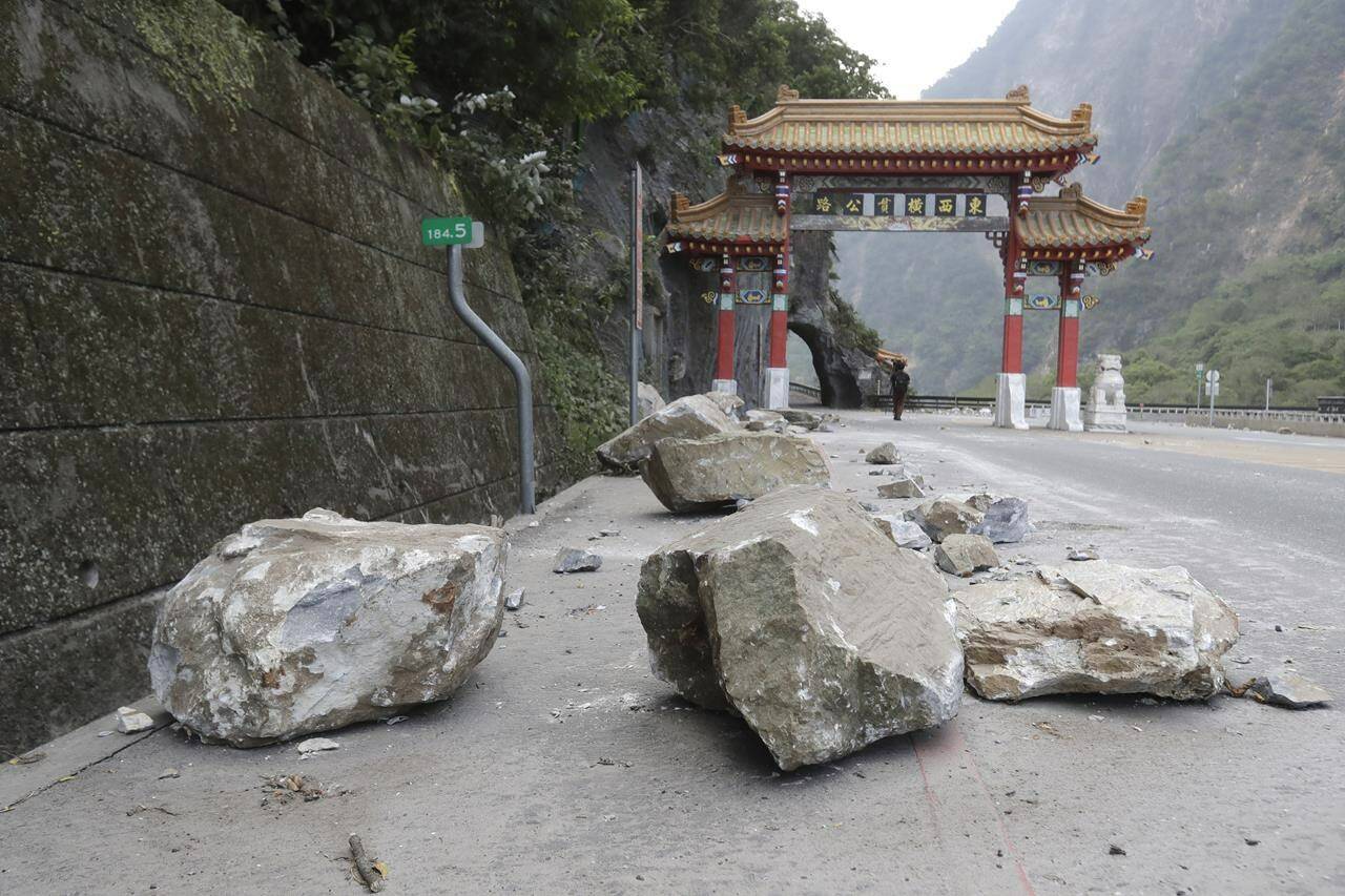 Taiwan’s Central News Agency says a Canadian missing after this week’s powerful earthquake on the island’s east coast has been found safe, citing information from the Central Emergency Operation Center. Rocks are on the road at the entrance of Taroko National Park in Hualien County, eastern Taiwan, Thursday, April 4, 2024. THE CANADIAN PRESS/Chiang Ying-ying