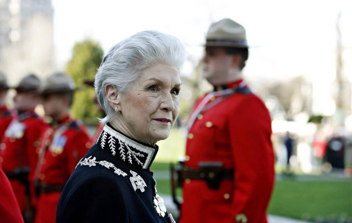 Iona Campagnolo, inspects uniforms when she was B.C. lieutenant-governor, before giving the speech from the throne at the B.C. legislature in Victoria on Feb. 14, 2006. Prime Minister Justin Trudeau confirmed Campagnolo has died at the age of 91. (Deddeda Stemler/The Canadian Press)