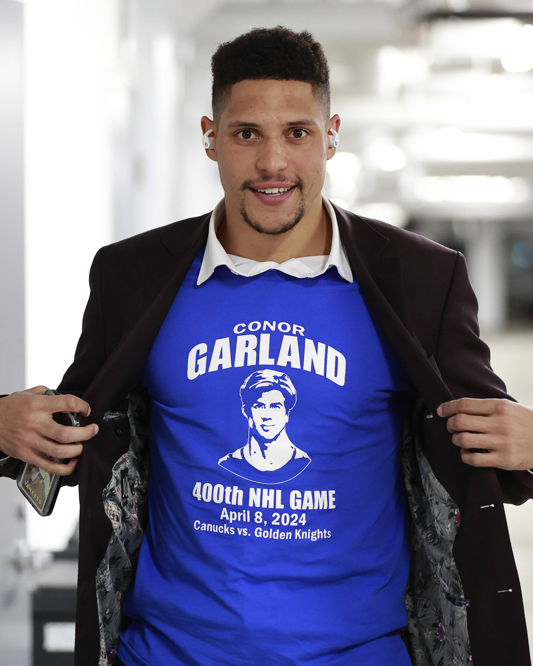 Vancouver’s Dakota Joshua arrives at Rogers Arena wearing a t-shirt comemarting Conor Garland’s 400th NHL game. Garland would score twice in the Canucks 4-3 win against the Vegas Golden Knights Monday night at Rogers Arena. Vancouver Canucks photo