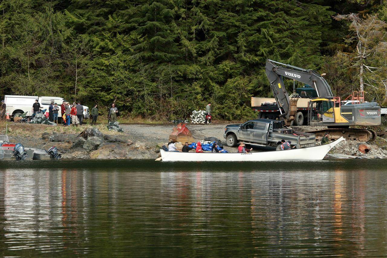 The Ehattesaht First Nation deployed a canoe and other resources to try and rescue the orphaned orca, but were unsuccessful, at a lagoon near Zeballos, B.C., Friday, April 12, 2024. THE CANADIAN PRESS/Chad Hipolito