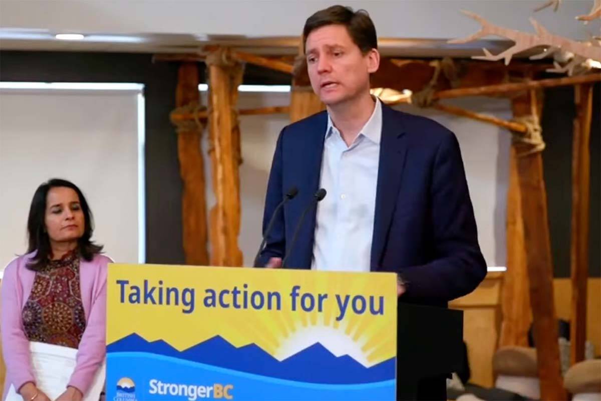 Premier David Eby, here seen with education minister Rachna Singh, Tuesday (April 16) defended the provincial carbon tax once more as the federal NDP faces questions about its position on carbon taxation. (Screencap)