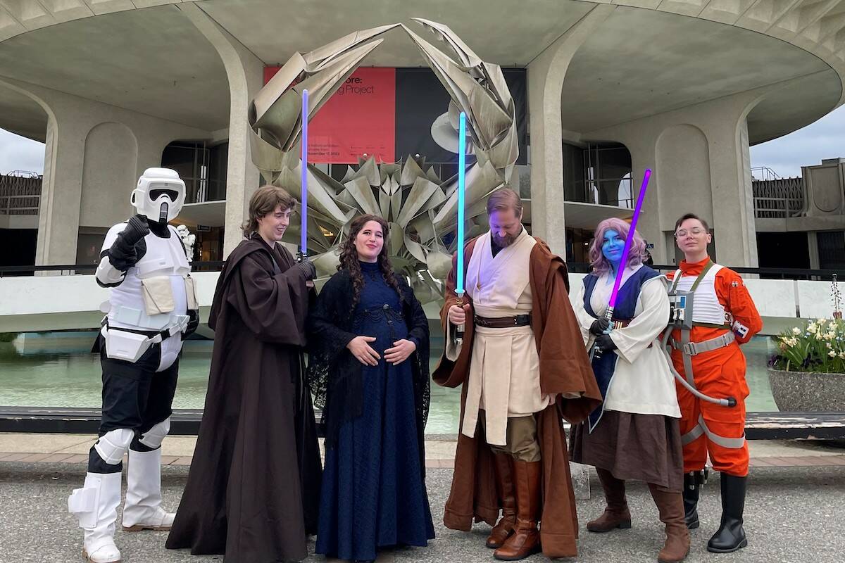 People dressed in "Star Wars" costumes outside H.R. MacMillan Space Centre in Vancouver. (Contributed photo)