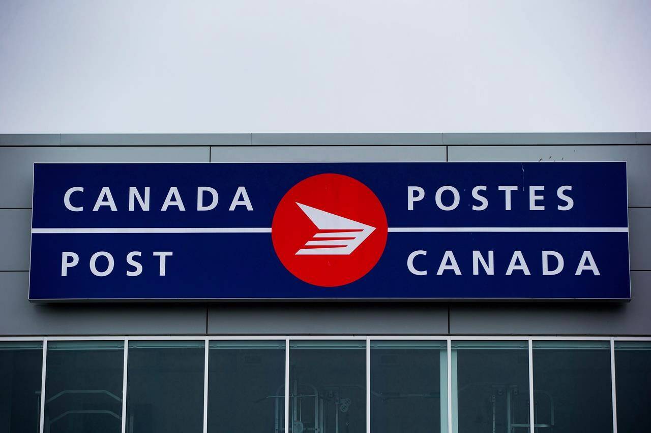 The Canada Post logo is seen on the outside the company’s Pacific Processing Centre in Richmond, B.C. on Thursday June 1, 2017. THE CANADIAN PRESS/Darryl Dyck