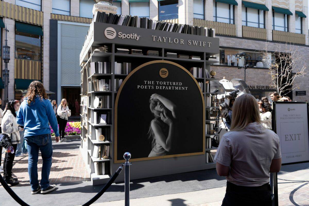 Taylor Swift fans took over the Grove in Los Angeles on Tuesday to celebrate Swift’s upcoming album, “The Tortured Poets Department.” An installation organized by Spotify hid clues about lyrics contained on the record. (April 17)
