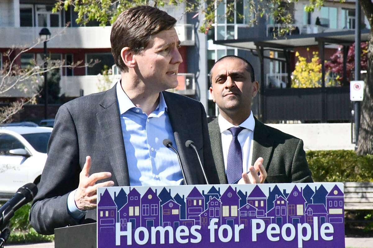 Premier David Eby, here seen with Housing Minister Ravi Kahlon, said Thursday that his government will continue to treat addiction as a mental health issue, but also promised additional resources for police to deal with public safety. (Matthew Claxton/Langley Advance Times)