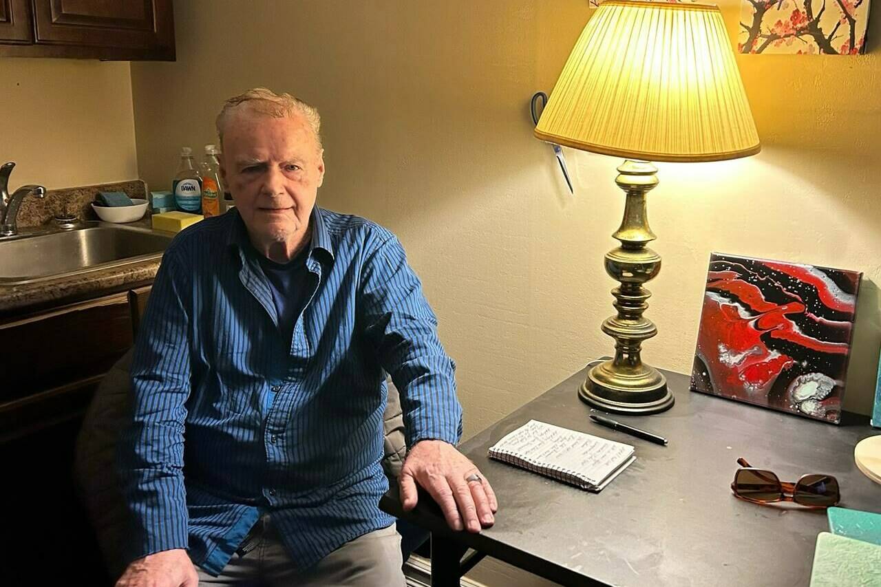 Walter Gillespie poses for a photo in his apartment in Saint John, N.B. on Tuesday, Jan. 9, 2024. Innocence Canada says Walter Gillespie, 80, died Friday morning in his home in Saint John, N.B. THE CANADIAN PRESS/Hina Alam
