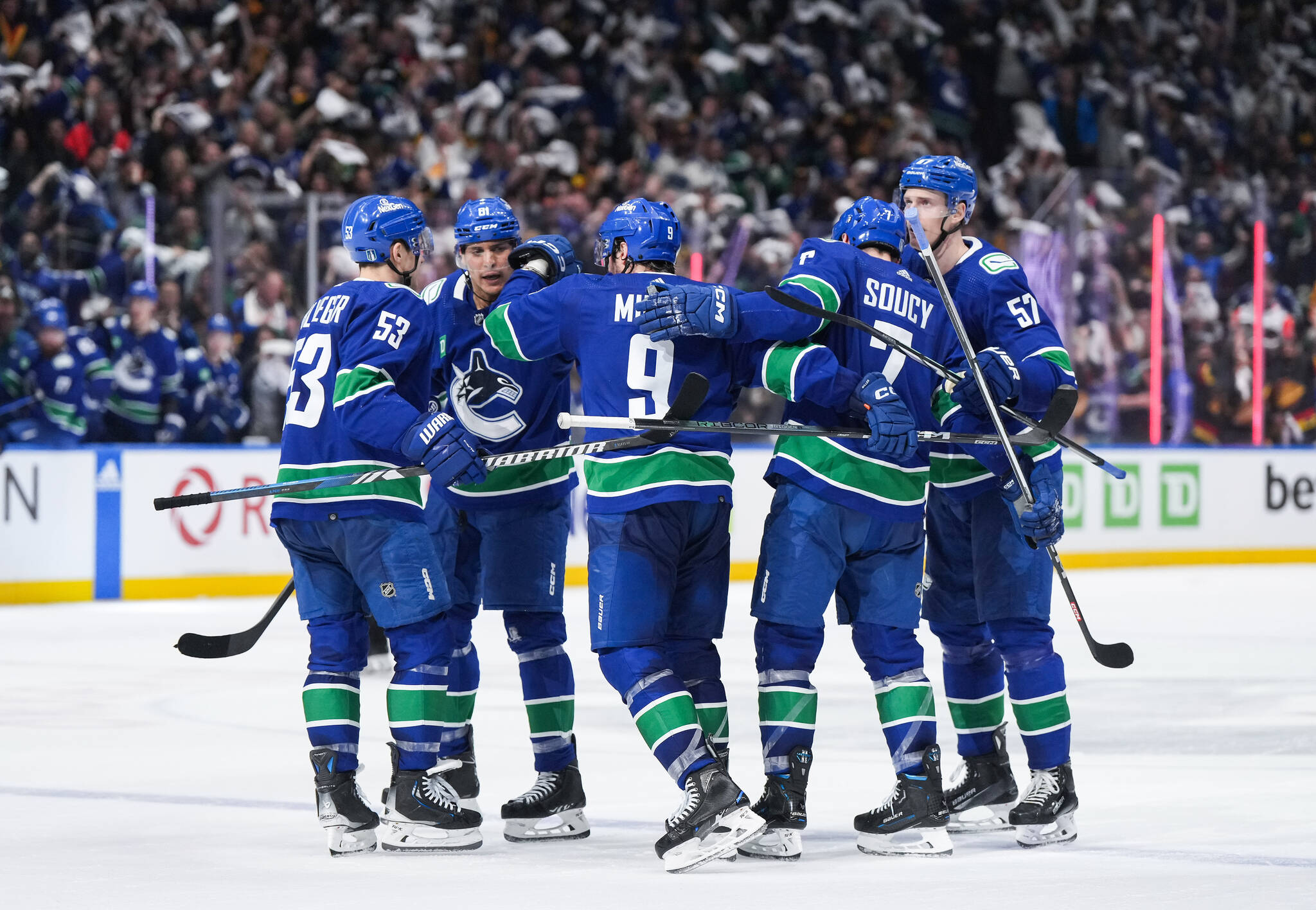 Vancouver Canucks' Teddy Blueger, Dakota Joshua, J.T. Miller, Carson Soucy and Tyler Myers celebrate Joshua's second goal against the Nashville Predators during the third period in Game 1 of an NHL hockey Stanley Cup first-round playoff series, in Vancouver, on Sunday, April 21, 2024. THE CANADIAN PRESS/Darryl Dyck