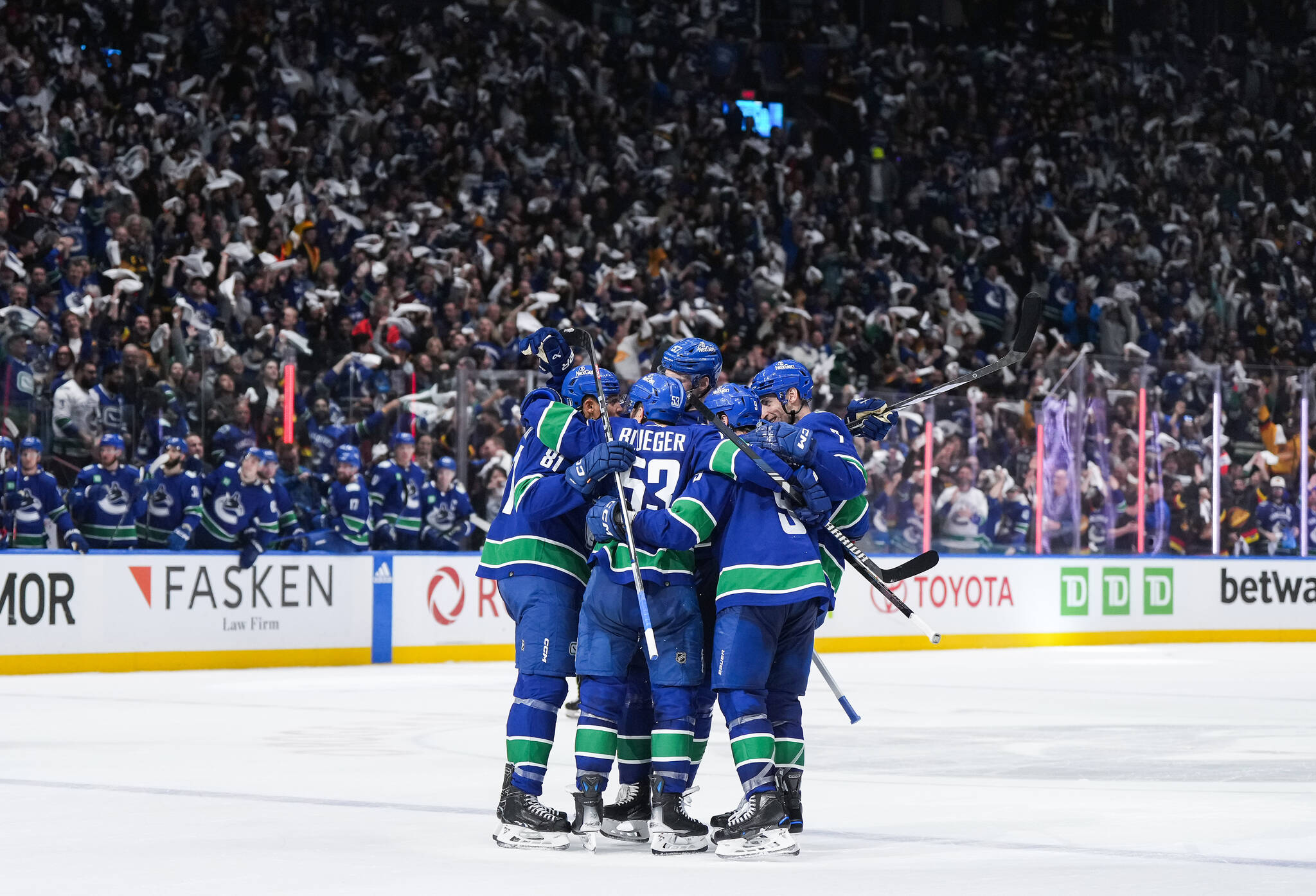 Vancouver Canucks’ Dakota Joshua, left to right, Teddy Blueger, Tyler Myers, J.T. Miller and Carson Soucy celebrate Joshua’s second goal against the Nashville Predators during the third period in Game 1 of an NHL hockey Stanley Cup first-round playoff series, in Vancouver, on Sunday, April 21, 2024. THE CANADIAN PRESS/Darryl Dyck